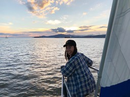 J in the sunset bathtime perched on the bow